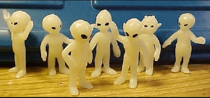 Group of glow in the dark alien toys