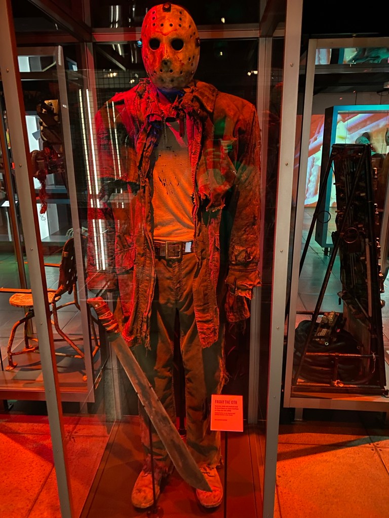 Jason Voorhees display inside of the glass display.